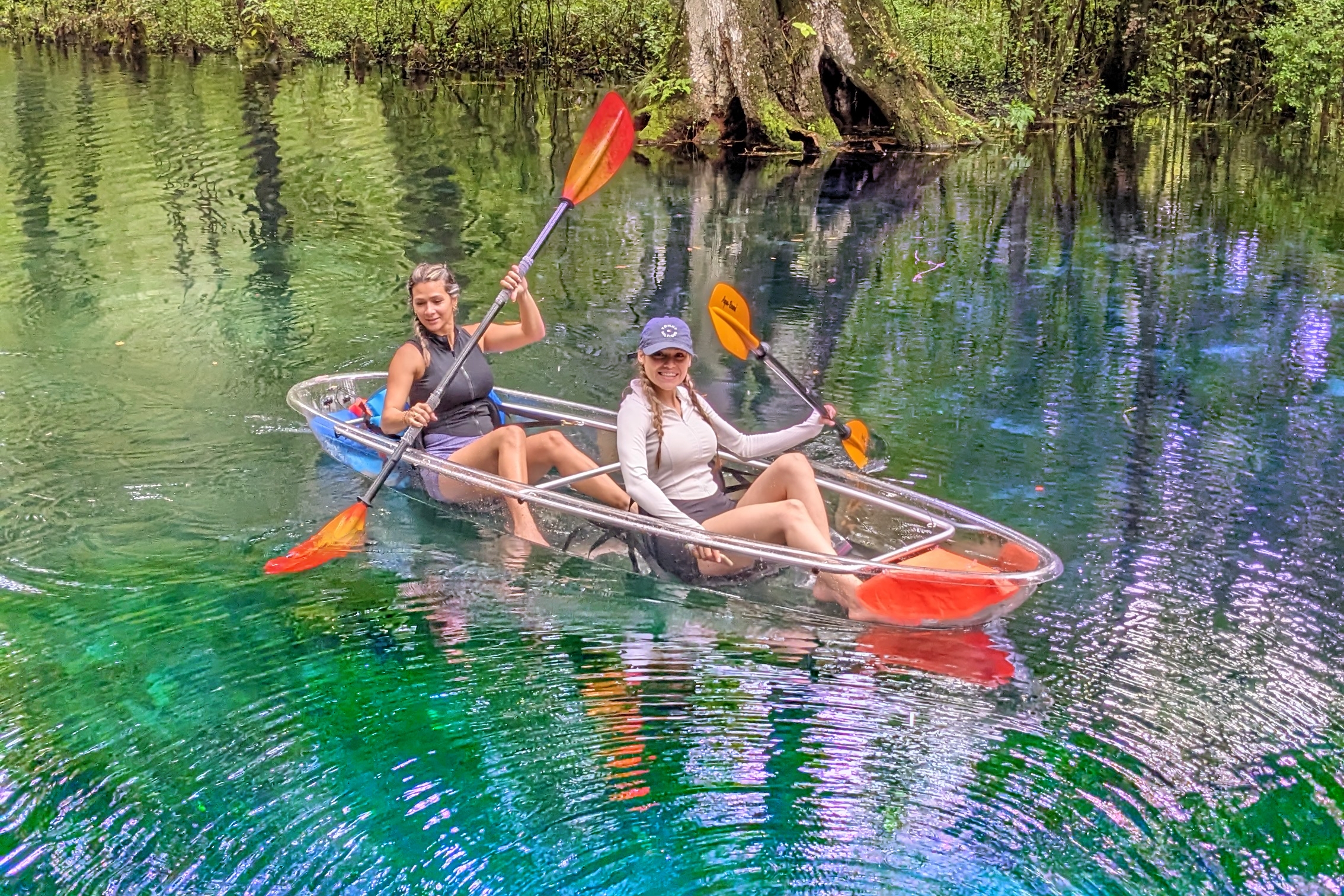 Image of person kayaking silver springs through the fort king paddle trail